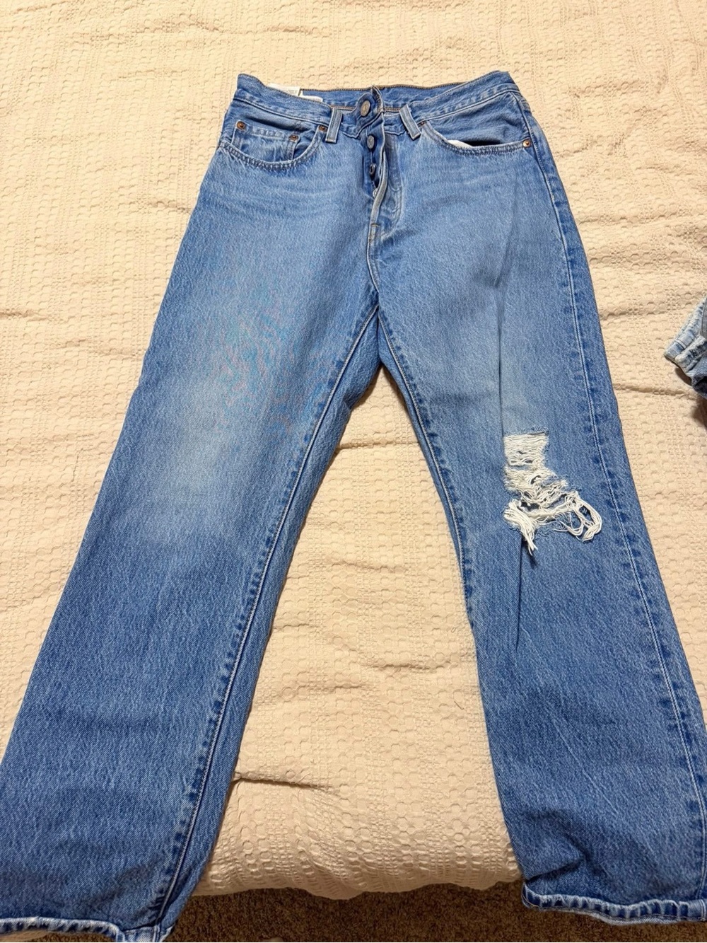 Levi's Light Blue Women's Straight-Leg Jeans with Distressed Knee